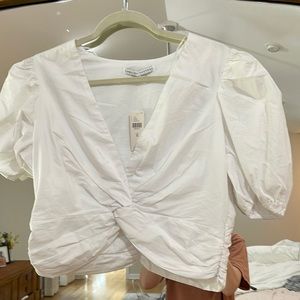 White midi knotted top with puff sleeves